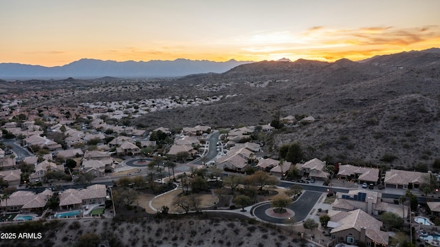 bird's eye view featuring a residential view and a mountain view