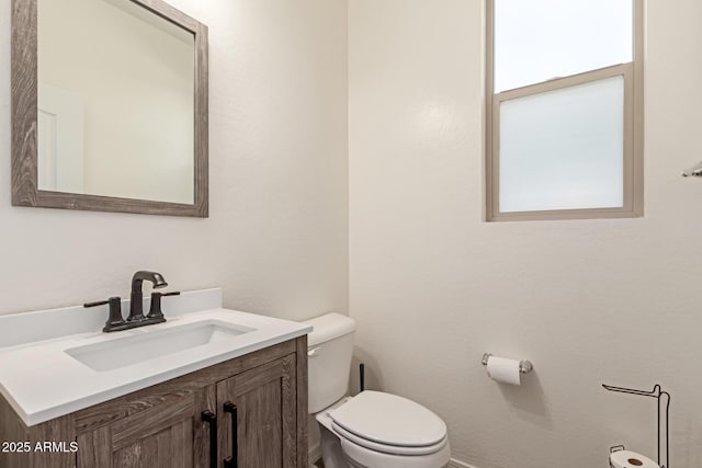 19771 W Woodlands Ave, Buckeye, AZ 85326 - half bath featuring toilet and vanity
