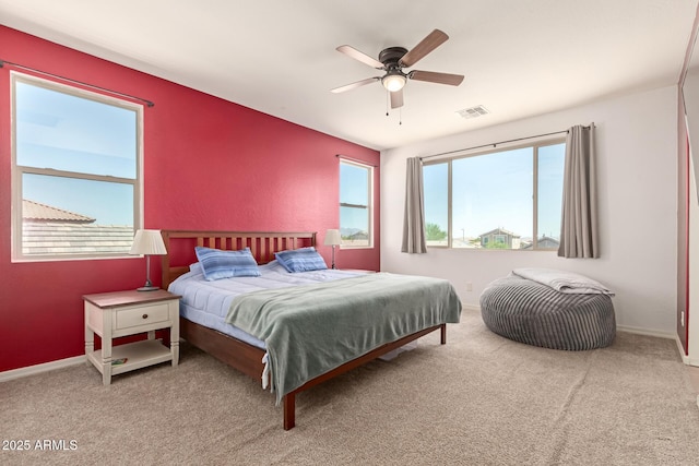 19771 W Woodlands Ave, Buckeye, AZ 85326 - carpeted bedroom featuring ceiling fan and baseboards