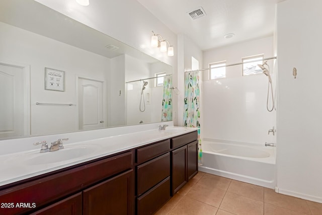 19771 W Woodlands Ave, Buckeye, AZ 85326 - full bathroom featuring shower / tub combo, tile patterned floors, and double vanity