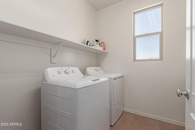 19771 W Woodlands Ave, Buckeye, AZ 85326 - washroom featuring independent washer and dryer and light tile patterned flooring