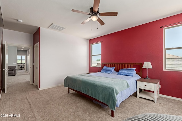 19771 W Woodlands Ave, Buckeye, AZ 85326 - carpeted bedroom featuring baseboards and a ceiling fan