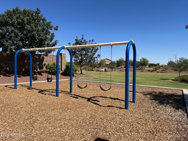 19771 W Woodlands Ave, Buckeye, AZ 85326 - community play area featuring a yard