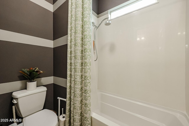 bathroom with toilet and shower / bath combination with curtain