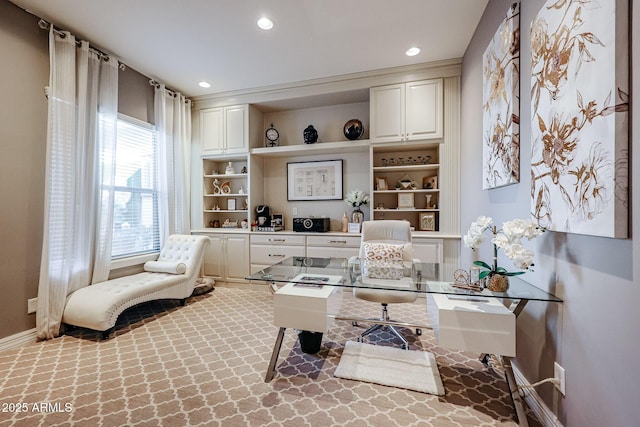 carpeted home office with baseboards, recessed lighting, and built in features