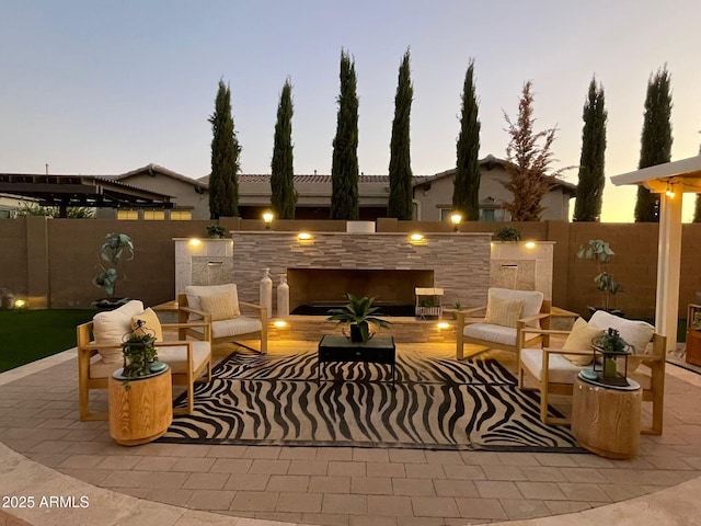 view of patio with an outdoor hangout area and a fenced backyard