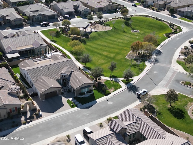 birds eye view of property with a residential view