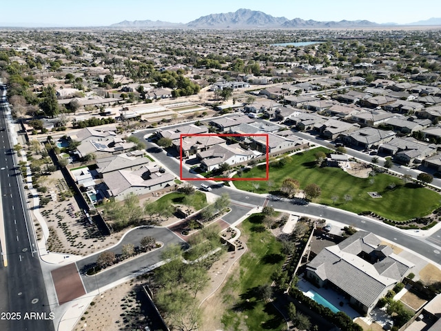 bird's eye view with a residential view and a mountain view
