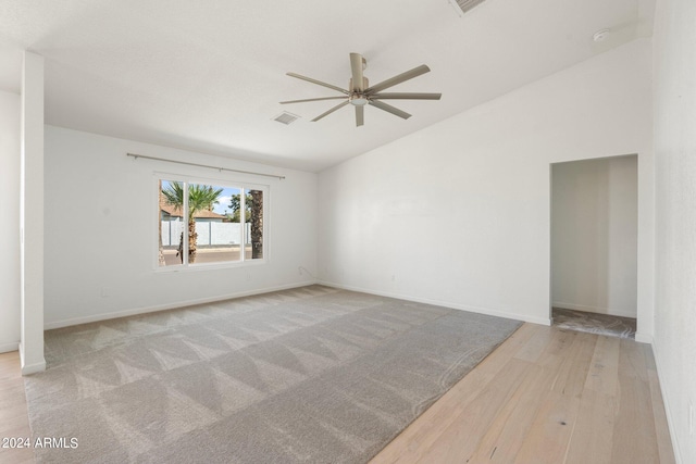 spare room with ceiling fan and light hardwood / wood-style flooring