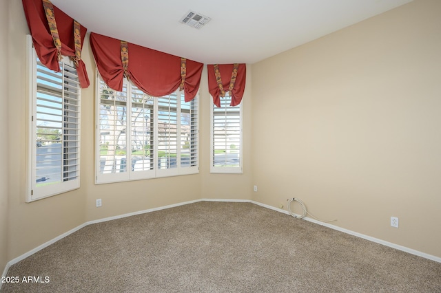 view of carpeted spare room