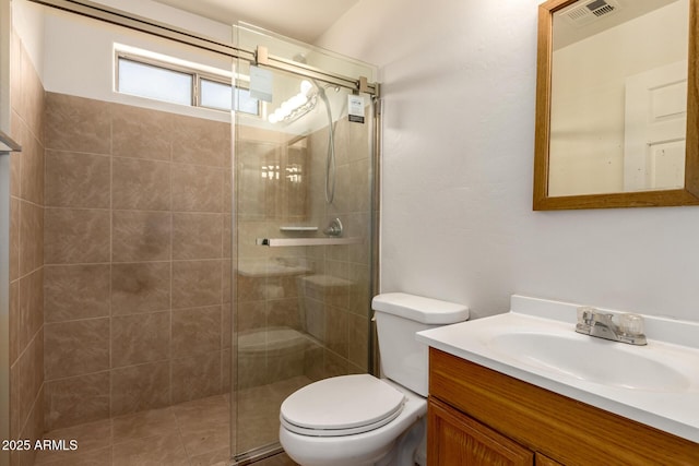 full bath featuring visible vents, vanity, toilet, and a shower stall