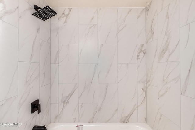 full bath featuring tub / shower combination