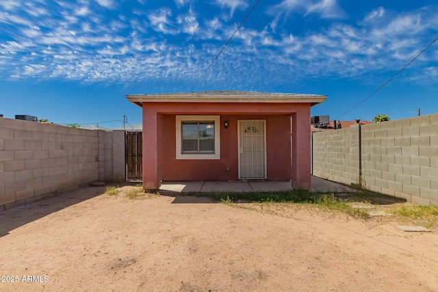 view of outbuilding with a fenced backyard