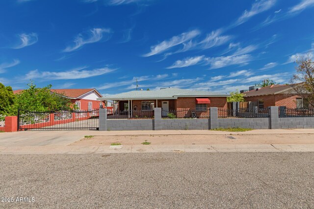 2936 E Willetta St, Phoenix, AZ 85008 - ranch-style home with a fenced front yard and brick siding
