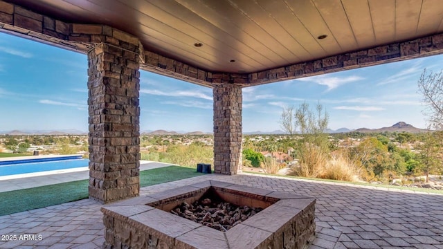 15217 N 15th Dr, Phoenix, AZ 85023 - view of patio / terrace featuring an outdoor fire pit, a mountain view, and an outdoor pool