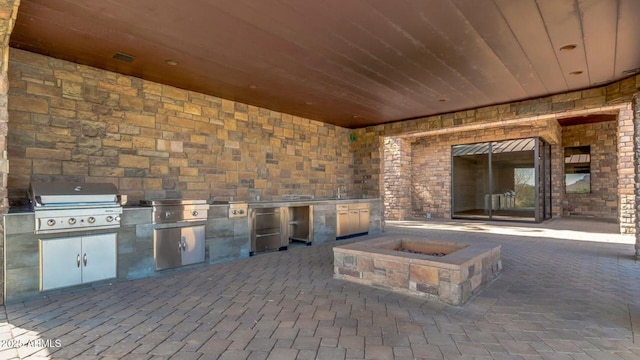 15217 N 15th Dr, Phoenix, AZ 85023 - view of patio / terrace featuring area for grilling, a grill, and a fire pit