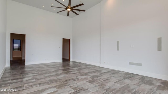 15217 N 15th Dr, Phoenix, AZ 85023 - unfurnished room featuring a ceiling fan, baseboards, and high vaulted ceiling