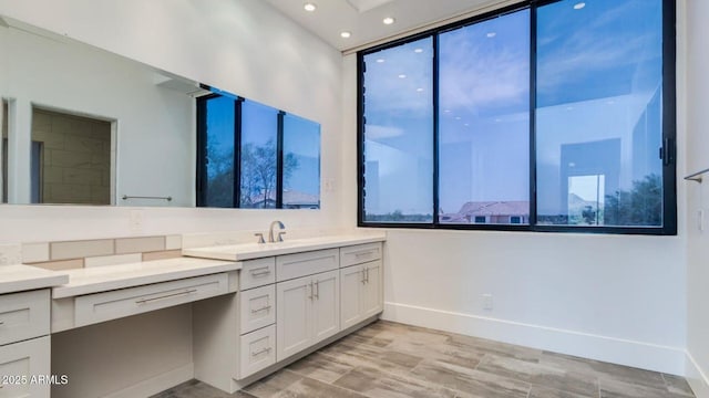 15217 N 15th Dr, Phoenix, AZ 85023 - bathroom featuring vanity, baseboards, and recessed lighting