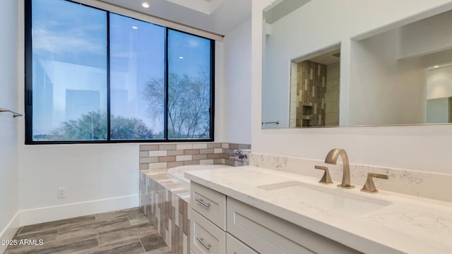 15217 N 15th Dr, Phoenix, AZ 85023 - full bathroom featuring baseboards and vanity
