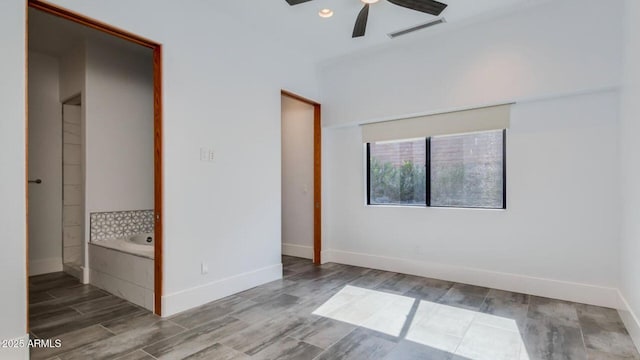 15217 N 15th Dr, Phoenix, AZ 85023 - unfurnished bedroom featuring baseboards, a ceiling fan, visible vents, and wood finished floors