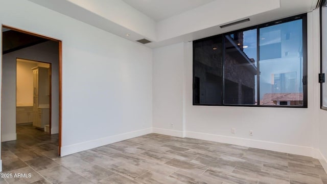 15217 N 15th Dr, Phoenix, AZ 85023 - unfurnished room featuring visible vents and baseboards