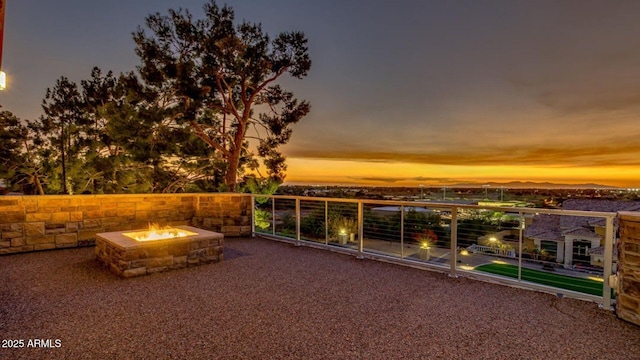 15217 N 15th Dr, Phoenix, AZ 85023 - patio terrace at dusk featuring a fire pit