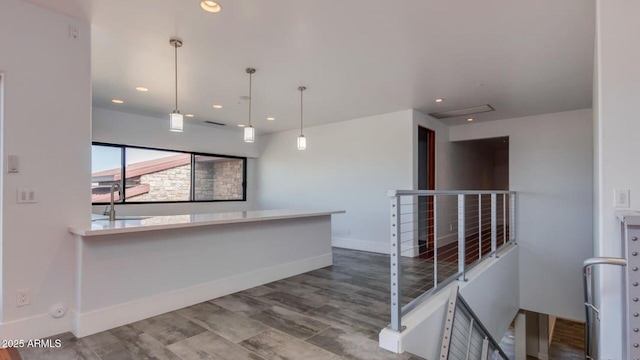 15217 N 15th Dr, Phoenix, AZ 85023 - kitchen with baseboards, hanging light fixtures, recessed lighting, and a sink