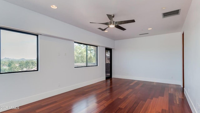 15217 N 15th Dr, Phoenix, AZ 85023 - unfurnished room with wood finished floors, visible vents, baseboards, ceiling fan, and recessed lighting