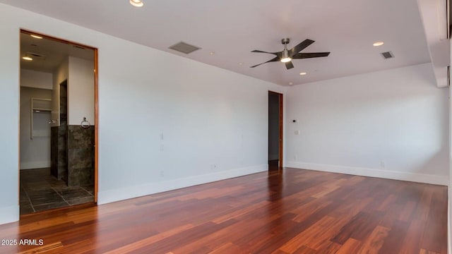 15217 N 15th Dr, Phoenix, AZ 85023 - empty room with visible vents, wood finished floors, baseboards, and ceiling fan