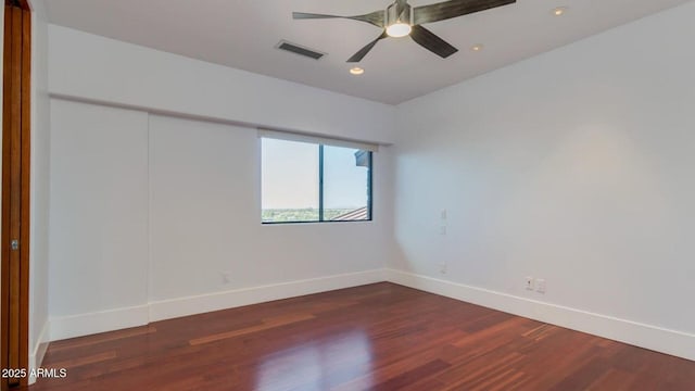 15217 N 15th Dr, Phoenix, AZ 85023 - empty room with a ceiling fan, recessed lighting, baseboards, visible vents, and wood finished floors