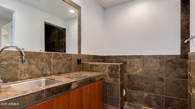 15217 N 15th Dr, Phoenix, AZ 85023 - bathroom with vanity, tile walls, and toilet