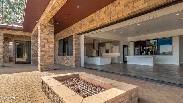 15217 N 15th Dr, Phoenix, AZ 85023 - view of patio with an outdoor fire pit
