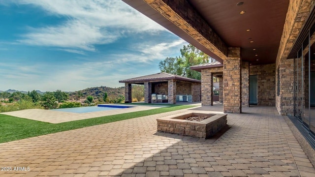 15217 N 15th Dr, Phoenix, AZ 85023 - view of patio with a fire pit, a mountain view, and a gazebo