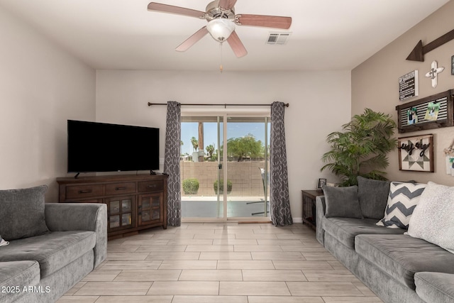 7726 E Baseline Rd Unit 154, Mesa, AZ 85209 - living room with ceiling fan and wood finish floors