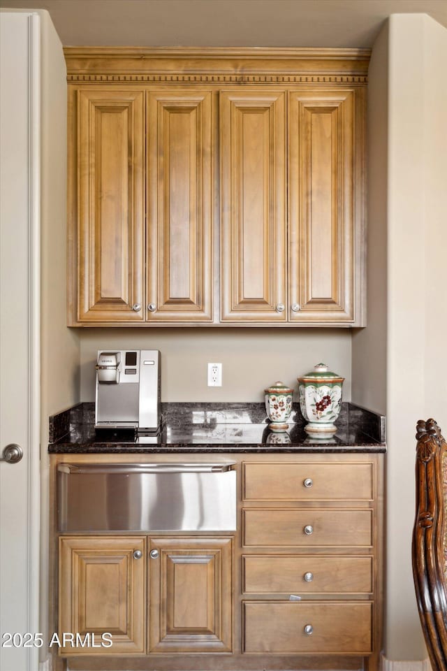 kitchen featuring dark stone counters