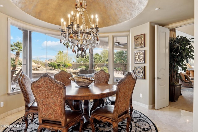 dining area with light tile patterned floors, baseboards, and a chandelier