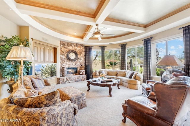 living area with carpet, coffered ceiling, plenty of natural light, and a fireplace