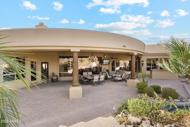 view of patio / terrace with an outdoor hangout area and a ceiling fan