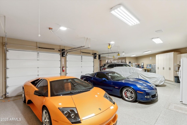 garage with freestanding refrigerator