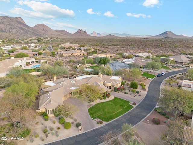 drone / aerial view with a residential view and a mountain view