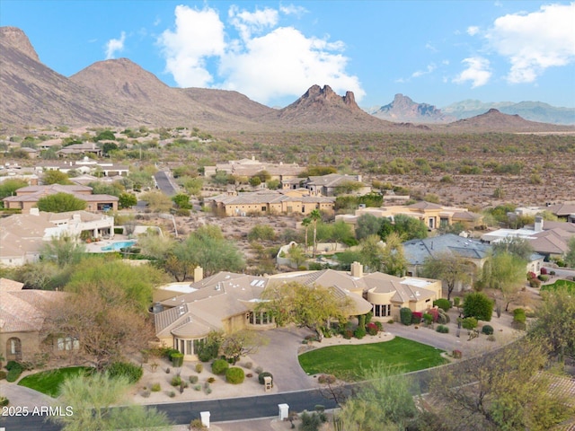 birds eye view of property with a residential view and a mountain view