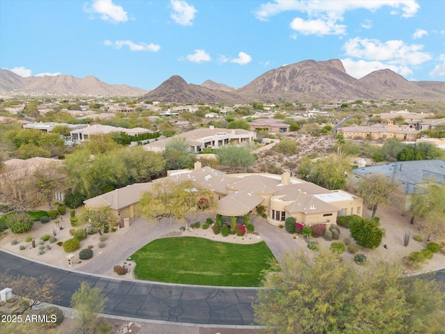 birds eye view of property with a residential view and a mountain view