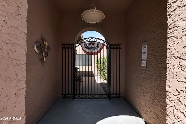 view of exterior entry with stucco siding