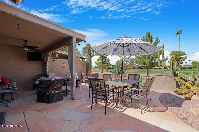 view of patio / terrace featuring ceiling fan