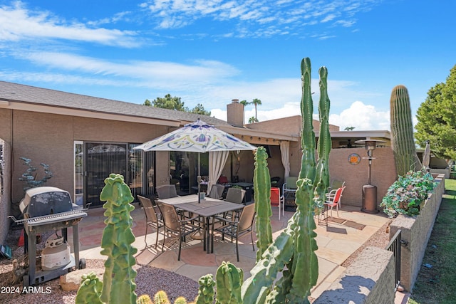 view of patio / terrace featuring outdoor dining space and area for grilling