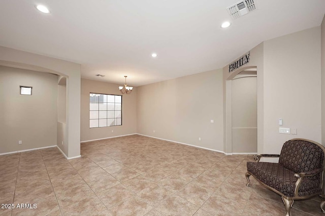 interior space featuring baseboards, visible vents, a notable chandelier, and recessed lighting