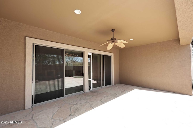 view of patio with a ceiling fan