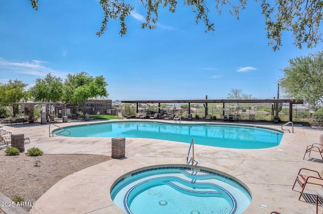 pool with a patio and fence