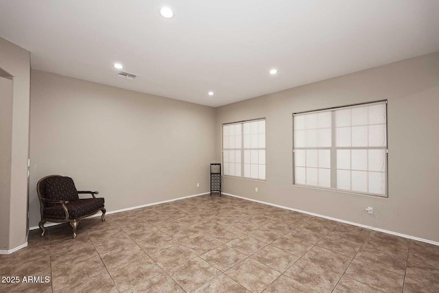 unfurnished room with light tile patterned flooring, visible vents, baseboards, and recessed lighting