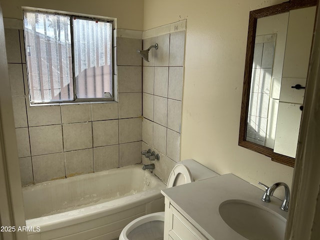 bathroom with vanity, shower / bathing tub combination, and toilet